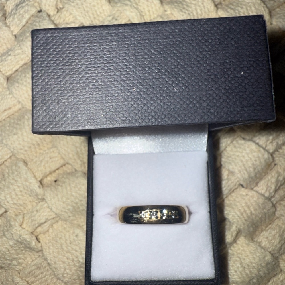 Elegant Black and Gold Ring with Diamond Accents